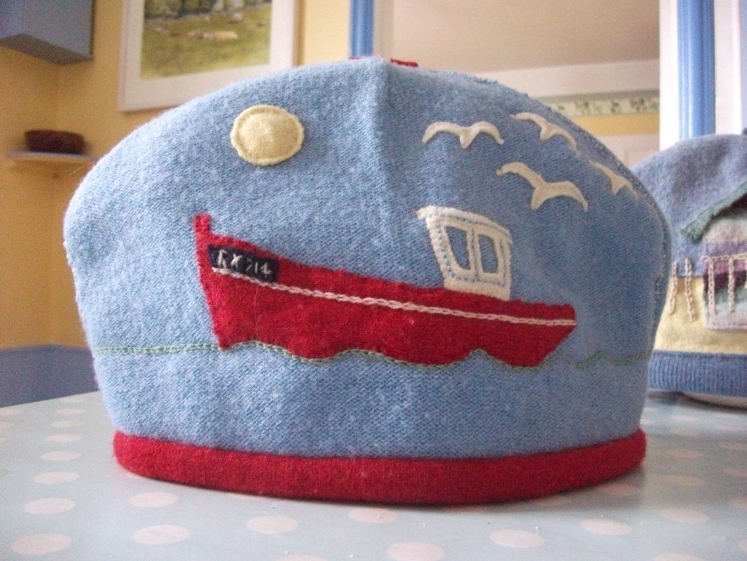 felted wool teacosy with fishing boatPicture