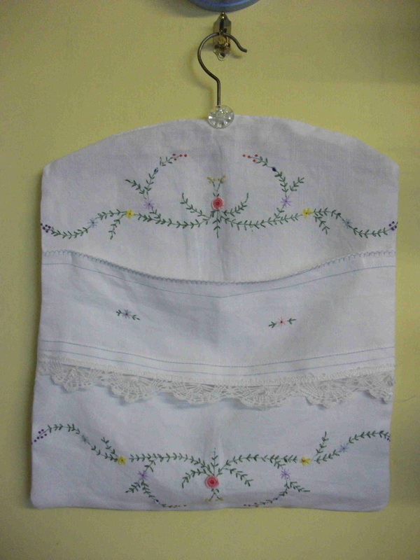 pegbag with vintage hand embroidery on linen with handmade lace